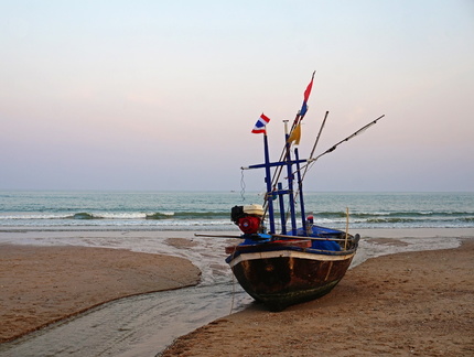 Fishing boat waiting for the tide to come in