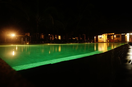 The pool at night at the resort in Trat