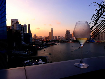view from balcony with a glass of wine