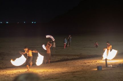 twirling sticks of fire