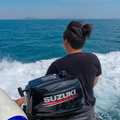 enjoying the view from the back of the boat